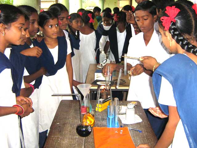 School girls and science experiment